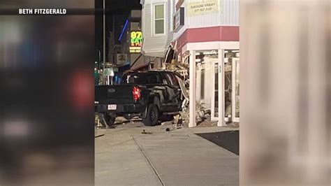 Driver hits several parked cars, slams into building in Taunton